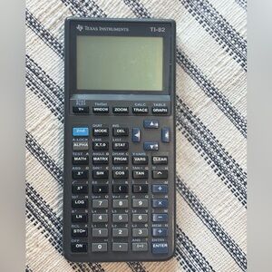 Texas Instruments Graphing Calculator. TI-82  Classic Gray. Works